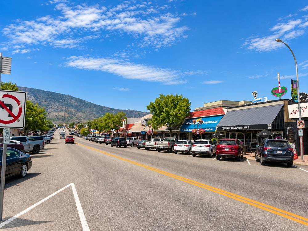 Downtown Osoyoos Main Street with parked cars and local shops