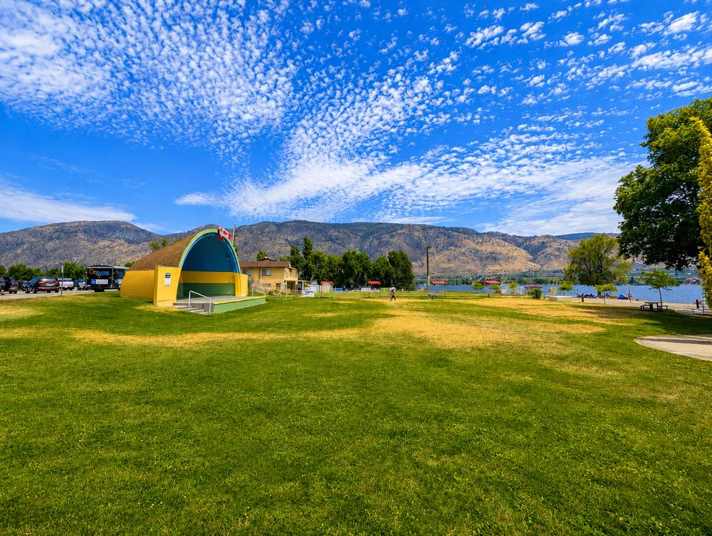 Gyro Park bandshell with lake and mountain view, Osoyoos